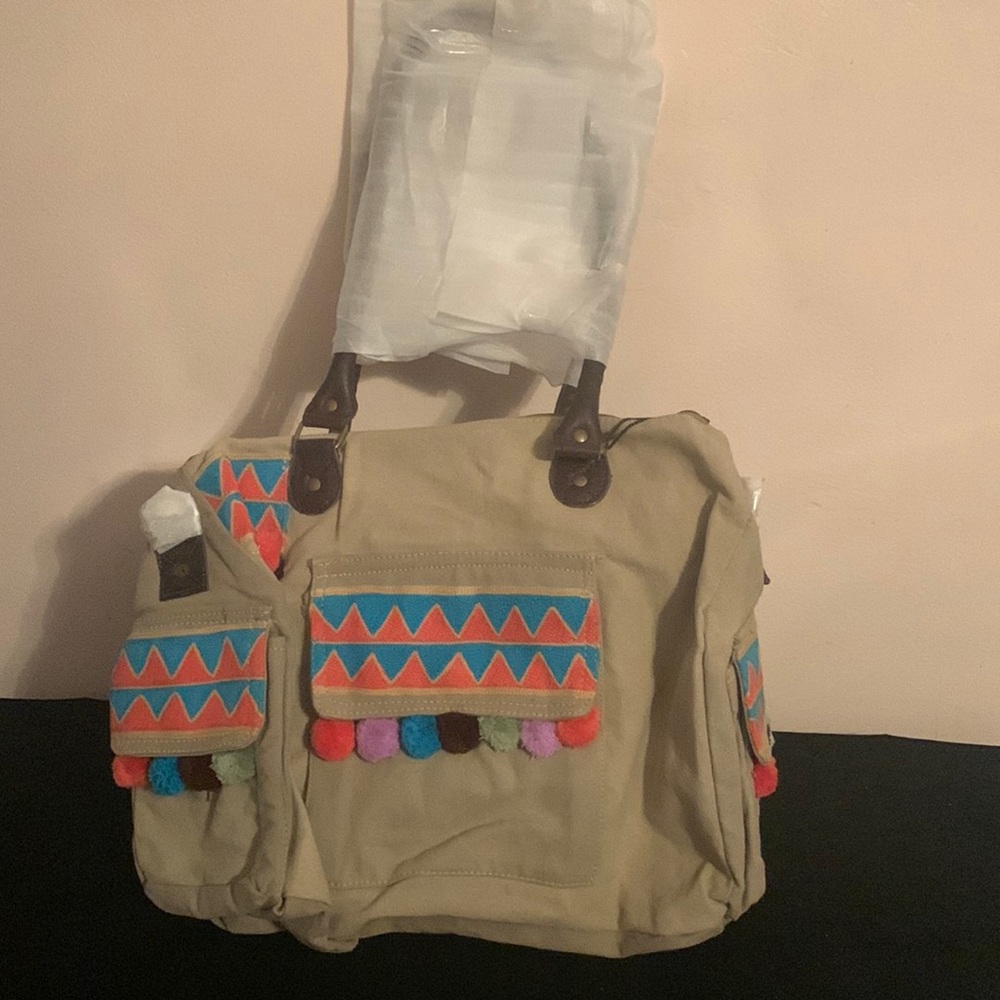 Vintage Addiction Bag with Pom-poms.